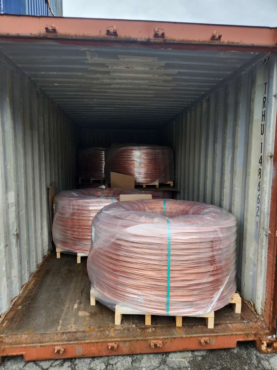 Coils stowed in a container